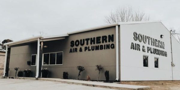 Southern Air & Plumbing commercial building exterior with company name signage on tan and white facade.